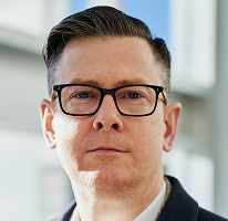 Dirigente di società di crypto trading Alexander Hughes ritratto del CEO